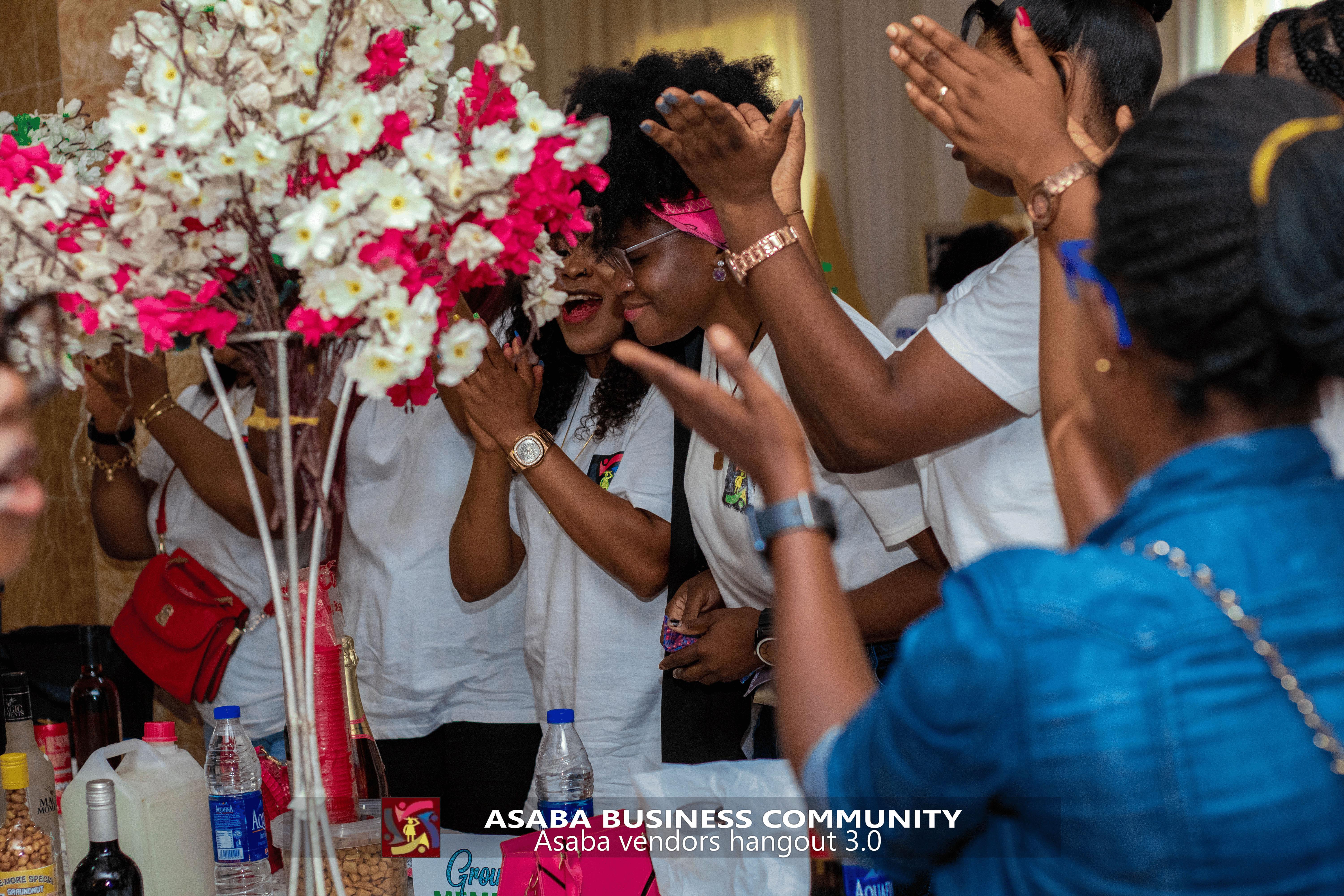 Asaba Business Community vendor exhibition showing stalls and visitors